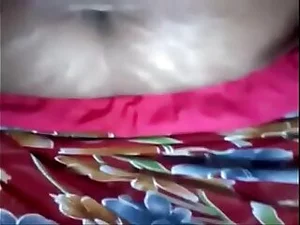 Bubbly Indian aunty receives a passionate handjob that highlights her enthusiastic nature in this Tamil Telgu video.